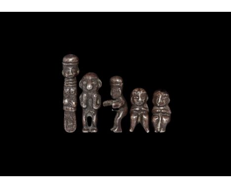 14th-15th century AD.
A group of five silver Capac Hucha figures consisting of two squatting, with arms crossed over chest; o