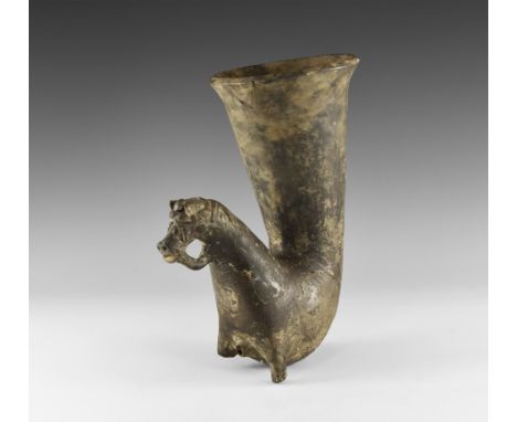 3rd century BC-3rd century AD. A terracotta rhyton with tubular body and everted rim, the finial a horse with bridle, spout t