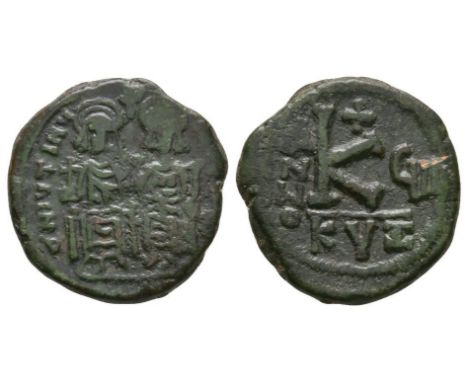 565-578 AD. Cyzicus mint. Obv: DN IVSTINVS PP AVG legend with Justin on the left, holding cross on globe and Sophia on the ri