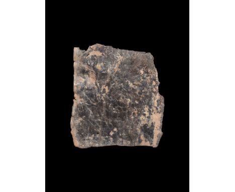 1st-4th century AD.
A rectangular thin sheet, one side showing six lines of cursive script; small piercing at one corner. 17.