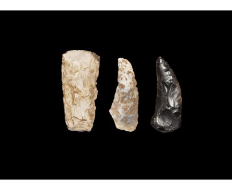 Neolithic, 5th-3rd millennium BC. A mixed flint group comprising: two curved sickle knife blades with concave cutting edges s