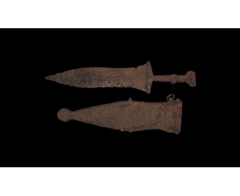 1st-3rd century AD. An iron pugio dagger, handle with rivets to the top for securing bone or wooden handle, blade curving in 