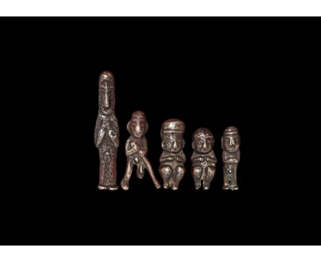 14th-15th century AD.
A group of five silver Capac Hucha figures consisting of two squatting, with arms across the chest; one