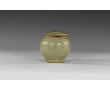 14th-16th century AD. A green glazed Sangkhalok Celadon ware pot with bulbous body with central rib; wide mouth with separate