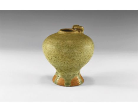 14th-16th century AD. A green glazed Sangkhalok Celadon ware vase with narrow mouth and small rim with applied ruyi head; glo