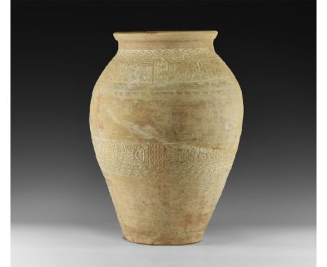 13th-15th century AD.
A large ceramic jar with rolled rim, body decorated with bands of intertwined floral patterns and Kufic