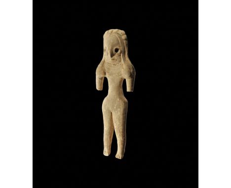 3rd-2nd millennium BC. A ceramic figurine with large D-shaped head and applied hair falling to the shoulders, applied collar 