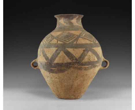 Neolithic, Majiayao Culture, 3300-2000 BC. A ceramic jar with flaring rim and short neck, globular body with painted decorati