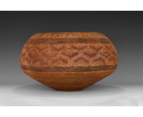 Harappa Culture, 4th-3rd millennium BC. A large ceramic vessel with globular body decorated with a band of fish to the rim; b