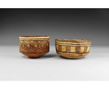 4th-3rd millennium BC. A group of ceramic bowls, one with band of roundels on the body and with double line to the rim and ba