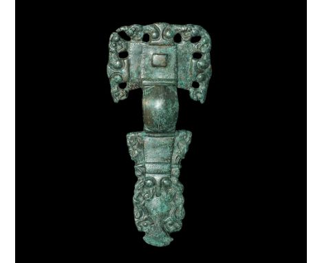 6th century AD.
A bronze cruciform brooch of the later 'florid' form with highly decorative openwork border to the headplate 