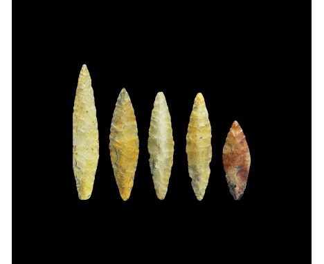 Neolithic, 4th-3rd millennium BC. A group of Volosovo culture stone arrowheads, each lentoid in section and leaf-shaped, fine