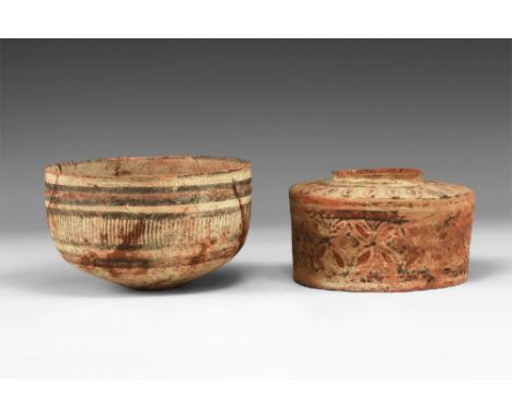 Nal Culture, 4th-3rd millennium BC. A pair of ceramic vessels, one a bowl with bands of horizontal and vertical painted lines
