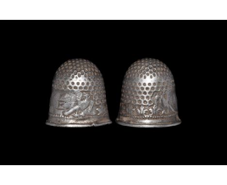 18th century AD. A silver thimble with the band to the base decorated with tow birds either side of the letters M R engraved,