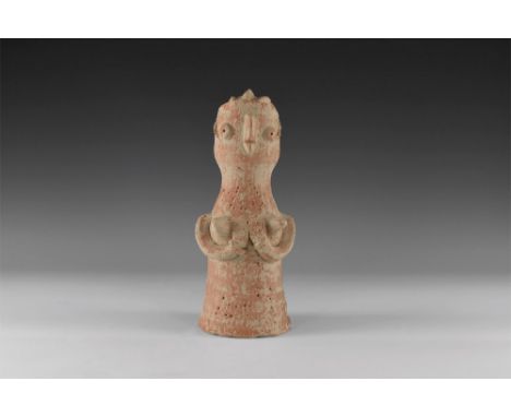 2nd millennium BC. A ceramic figure of a nude female, the goddess Asherah, with cylindrical body, hands between breasts; larg