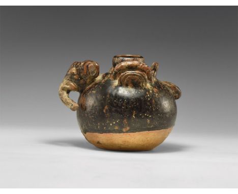 14th-16th century AD. A brown glazed Sangkhalok ware vessel with small spout with applied handles to either side and with dec