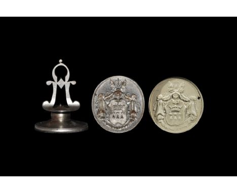 18th century AD. A cut steel chessman seal matrix with round section short shaft and pierced handle with circular loop; the o