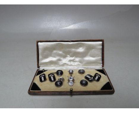 A CASED SET OF ART DECO DESIGN SILVER AND ENAMEL CUFFLINKS AND COLLAR STUDS ETC.