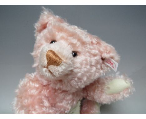A STEIFF LIMITED EDITION 'TEDDY BEAR ROSE 38' MOHAIR BEAR, button in ear, white tag 654480, number 1537 of 3000, working grow