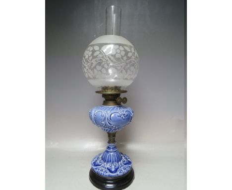 A VICTORIAN BLUE CERAMIC OIL LAMP, with twin Duplex burner, decorative glass shade and clear chimney, approx overall H 53 cm