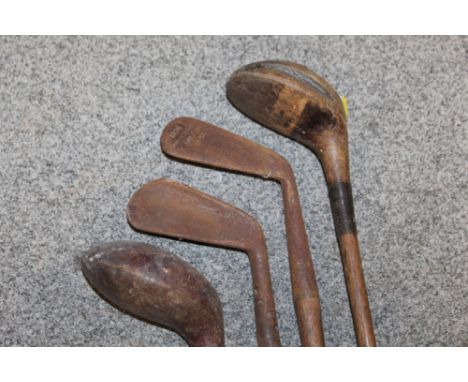 A LARGE QUANTITY OF VINTAGE WOODEN HANDLED GOLF CLUBS, some marked C H Clay, together with a quantity of vintage and modern t