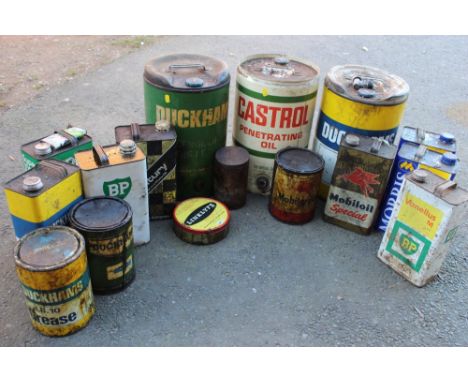 A SELECTION MOSTLY OF OIL CANS / LUBRICANTS, to include 5 gallon examples- Castrol, Duckhams etc, together with smaller examp
