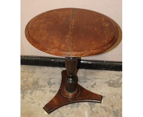 A NINETEENTH CENTURY CARVED PEDESTAL TABLE, on ceramic bun feet, Dia.. 61 cm, H 72 cm