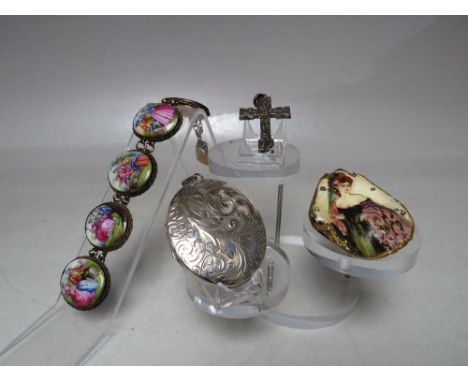 A HALLMARKED SILVER OVAL PENDANT LOCKET, H 6.5 cm inc bail, together with a hallmarked vintage silver cross, a Limoges style 