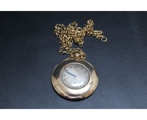 A HALLMARKED 9 CARAT GOLD OPEN FACED MANUAL WIND POCKET WATCH, on hallmarked 9 carat gold chain, approx weight of watch 46g, 