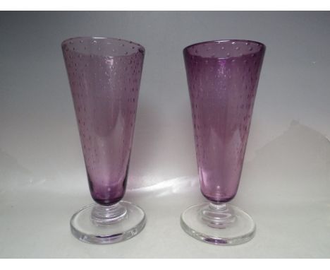 A PAIR OF KEITH MURRAY FOR STEVENS &amp; WILLIAMS (ROYAL BRIERLEY) AMETHYST GLASS VASES, of flared cylindrical form, with bub