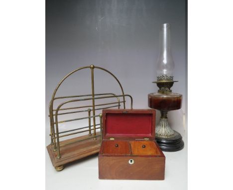 A SELECTION OF ITEMS TO INCLUDE A BRASS FRAMED MAGAZINE RACK, together with a twin burner oil lamp, wooden tea caddy etc.