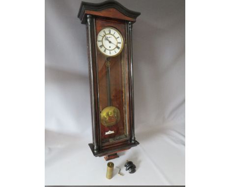 A LARGE LATE NINETEENTH CENTURY WALNUT VIENNA WALLCLOCK, enamel dial, with single brass weight, H 112 cm, with pendulum and k