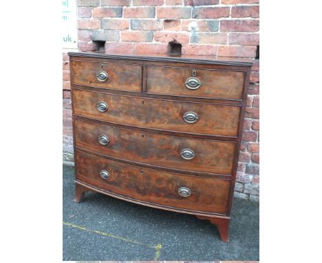 A NINETEENTH CENTURY MAHOGANY BOW-FRONTED CHEST OF DRAWERS, having two short above three longer graduated drawers, later hand