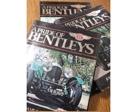 JOHN ADAMS AND RAY ROBERTS - AN INSPECTION COPY OF 'A PRIDE OF BENTLEYS' HARD BACK BOOK, signed by Ray Roberts, no obvious no