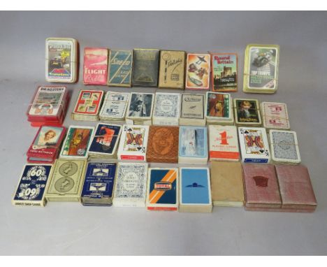 A SELECTION OF VINTAGE PLAYING CARDS AND GAMING CARDS