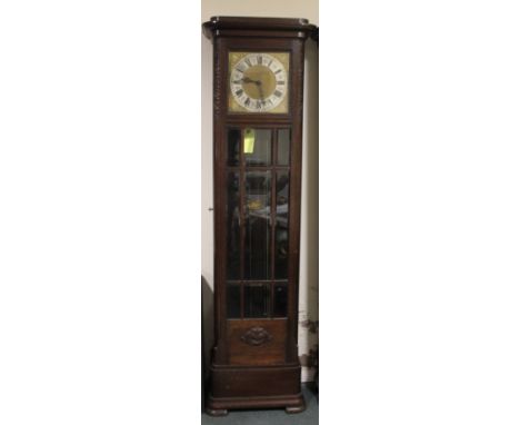 AN EARLY TWENTIETH CENTURY OAK GLAZED LONGCASE CLOCK, with triple weight, the gilt and silvered dial with a Westminster / Whi