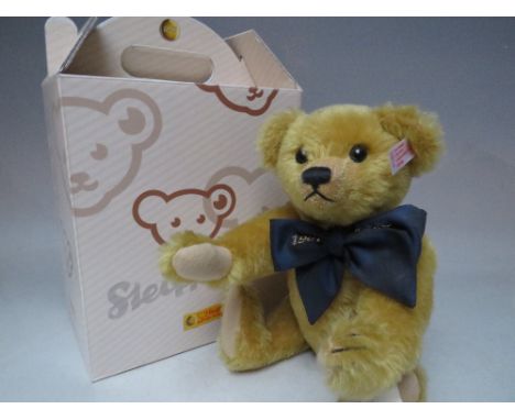 A STEIFF LIMITED EDITION 'A MILLION HUGS' 100TH BIRTHDAY CELEBRATION BEAR 1907 / 2007, bright brass / blond edition, number 2