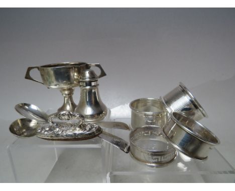 A SELECTION OF ASSORTED HALLMARKED SILVER COLLECTABLES, to include a pair of hallmarked silver napkins rings with engine turn