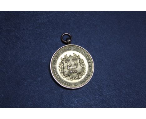 A HALLMARKED 9 CARAT GOLD STAFFORDSHIRE COUNTY WATER POLO AND SWIMMING ASSOCIATION MEDAL BY C USHER OF BIRMINGHAM, awarded fo