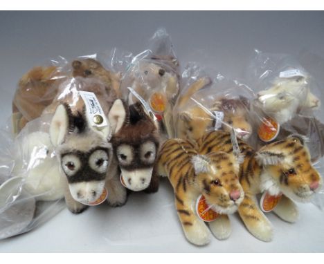 A COLLECTION OF STEIFF NOAHS ARK ANIMALS ETC., comprising dove set, camel set, lion set, tiger set, donkey set, llama set and