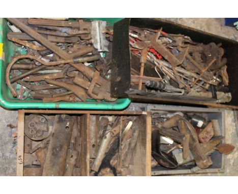 FOUR BOXES CONTAINING VARIOUS PIPE WRENCHES, assorted G-clamps, box spanners, shoe lasts, roofing tool, spanners etc