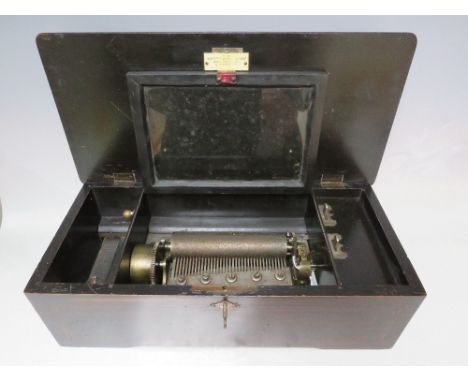 A MAHOGANY CASED SWISS 8 AIR MUSIC BOX, having a glass panelled dust cover, two side levers for play / stop and repeat / play
