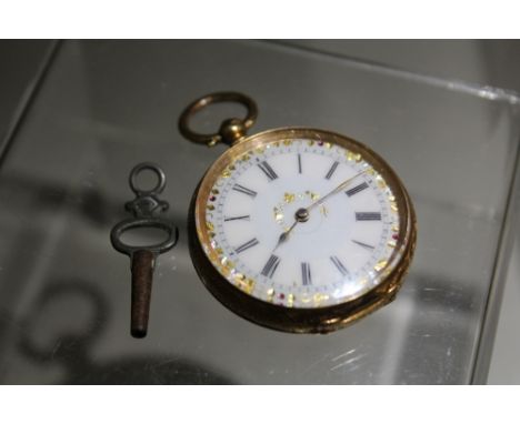 A GOLD CASED LADIES FOB WATCH STAMPED 14K, open faced, enamel dial, W 3.8 cm 