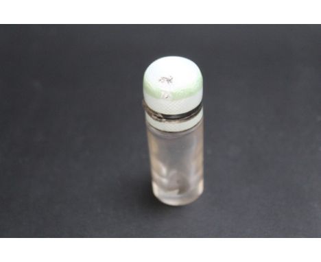 A CONTINENTAL SILVER AND ENAMEL TOPPED SCENT BOTTLE, with glass stopper, H 6.25 cmCondition Report:enamel damaged