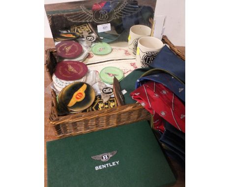 A COLLECTION OF BENTLEY / MOTORING RELATED COLLECTABLES, to include sew on badges, two enamel coasters, a Bentley Continental