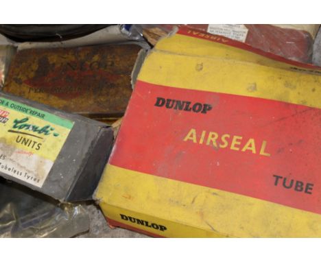 A SELECTION OF NEW OLD STOCK DUNLOP CAR TYRE INNER TUBES, John Bull snow tyre clips and a selection of tyre levers plus a set