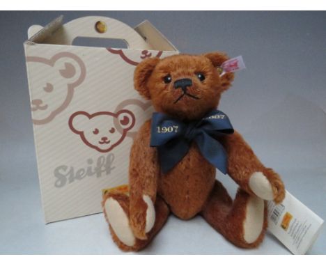 A STEIFF LIMITED EDITION 'A MILLION HUGS' 100TH BIRTHDAY CELEBRATION BEAR 1907 / 2007, red brown edition, number 2281/3000, b