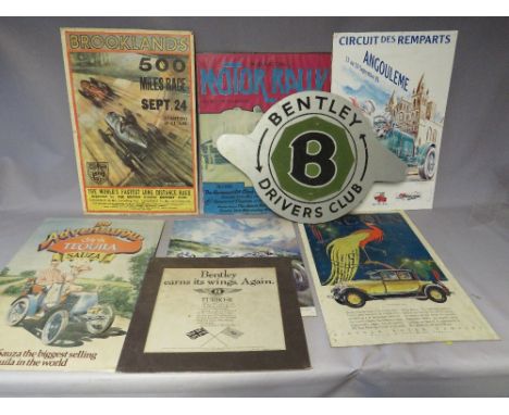 A QUANTITY OF AUTOMOBILE RELATED COLOURED WALL CARDS, together with a bespoke Bentley Drivers Club sign (8)