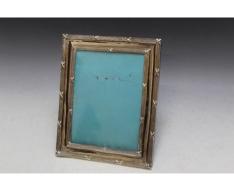 A HALLMARKED SILVER EASEL BACK PHOTO FRAME - BIRMINGHAM 1907. H 26.75 cm