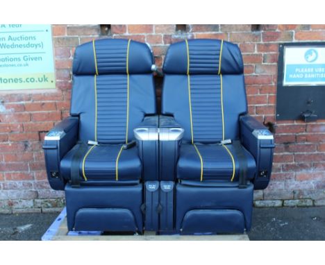 A PAIR OF VINTAGE FIRST CLASS AIRPLANE SEATS FROM A QANTAS 747 JUMBO JET, on original cast fixings, recently re-upholstered i